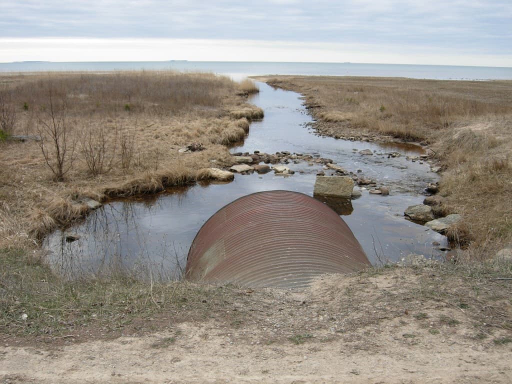 A road culvert near Green Bay. Culverts can hamper the movement of aquatic species throughout a stream network. Cadmus’ work for The Nature Conservancy has helped to identify barrier upgrades that provide the greatest gains in stream connectivity.