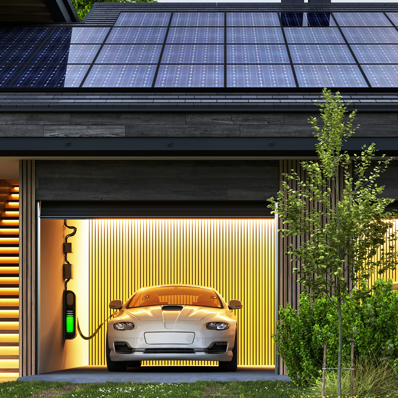 electric car charging. solar panels attached to home