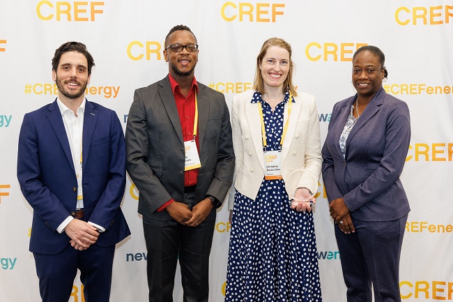 Group of four people with CREF award smiling for picture