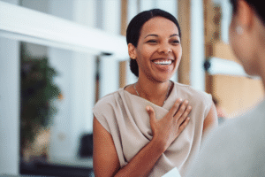 Woman receiving recognition