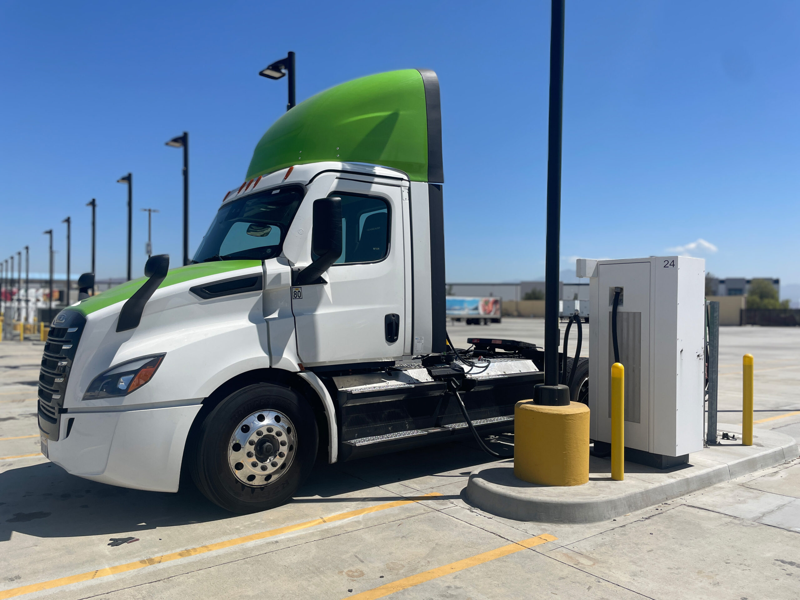 Heavy duty truck charging at an electric vehicle charging station