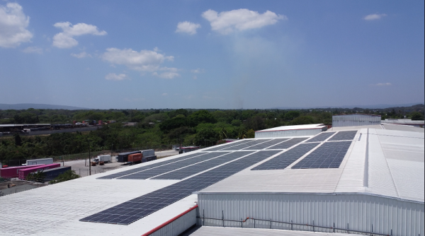 Solar panels on industrial rooftop
